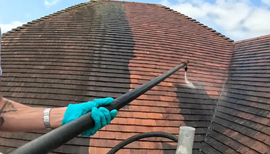 Professional roof cleaning to protect your roof warranty